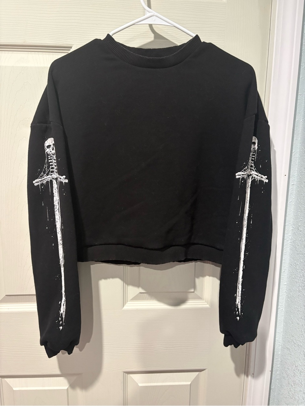 Disturbia Black Crewneck cropped sweatshirt with details on sleeve and back